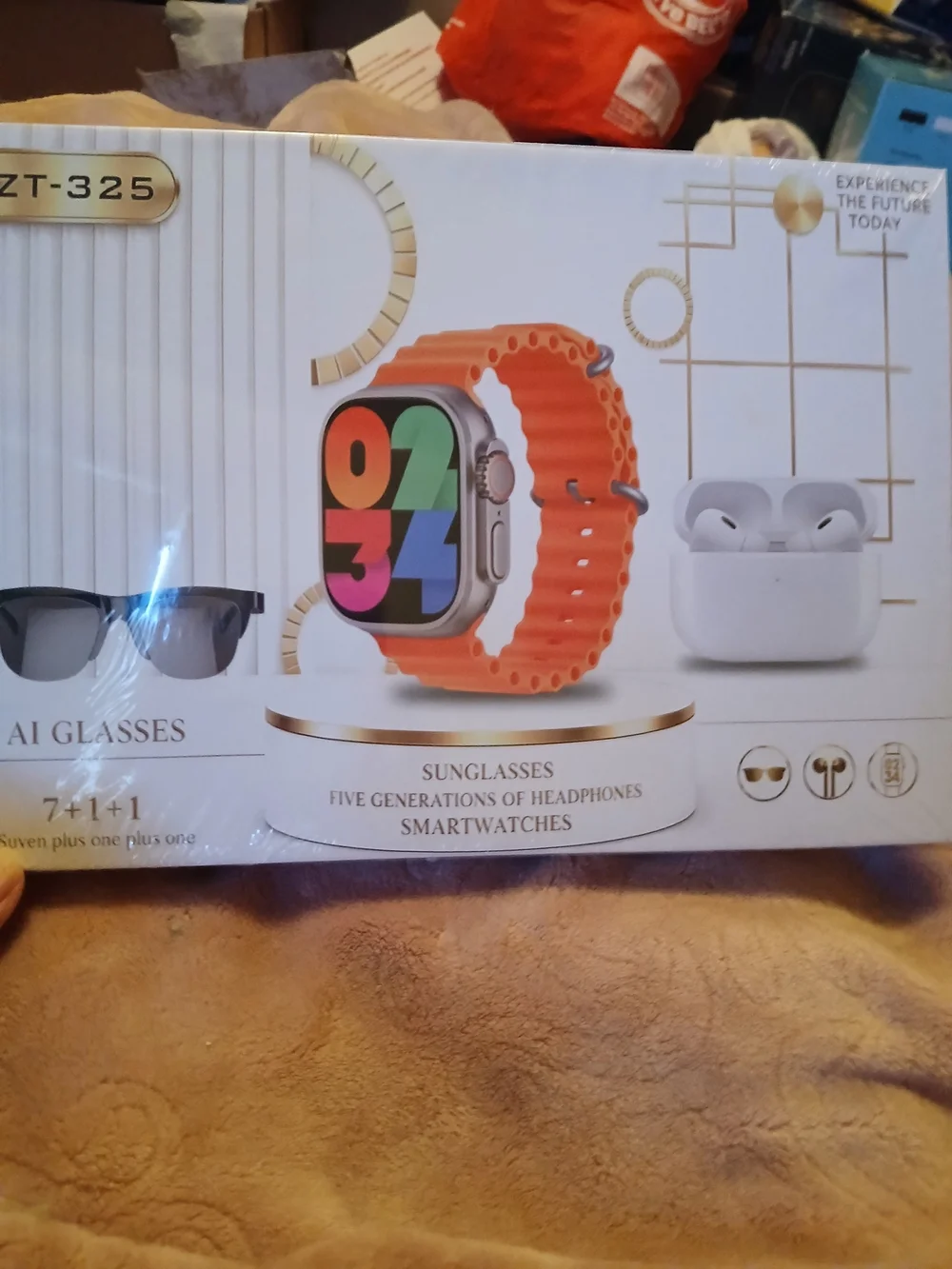 ZT-325 electronics gift bundle containing a smartwatch, earbuds, AI sunglasses